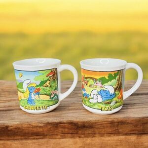 2 Vintage Smurfette and Lazy Mugs 1982 Smurf  Wallace Berrie Japan Cup 1595 1597